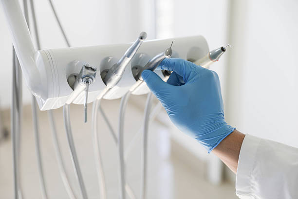 Professional Emergency Dentist technician working in St. Johns, MI